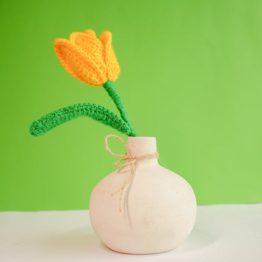 onion vase with yellow crochet tulip