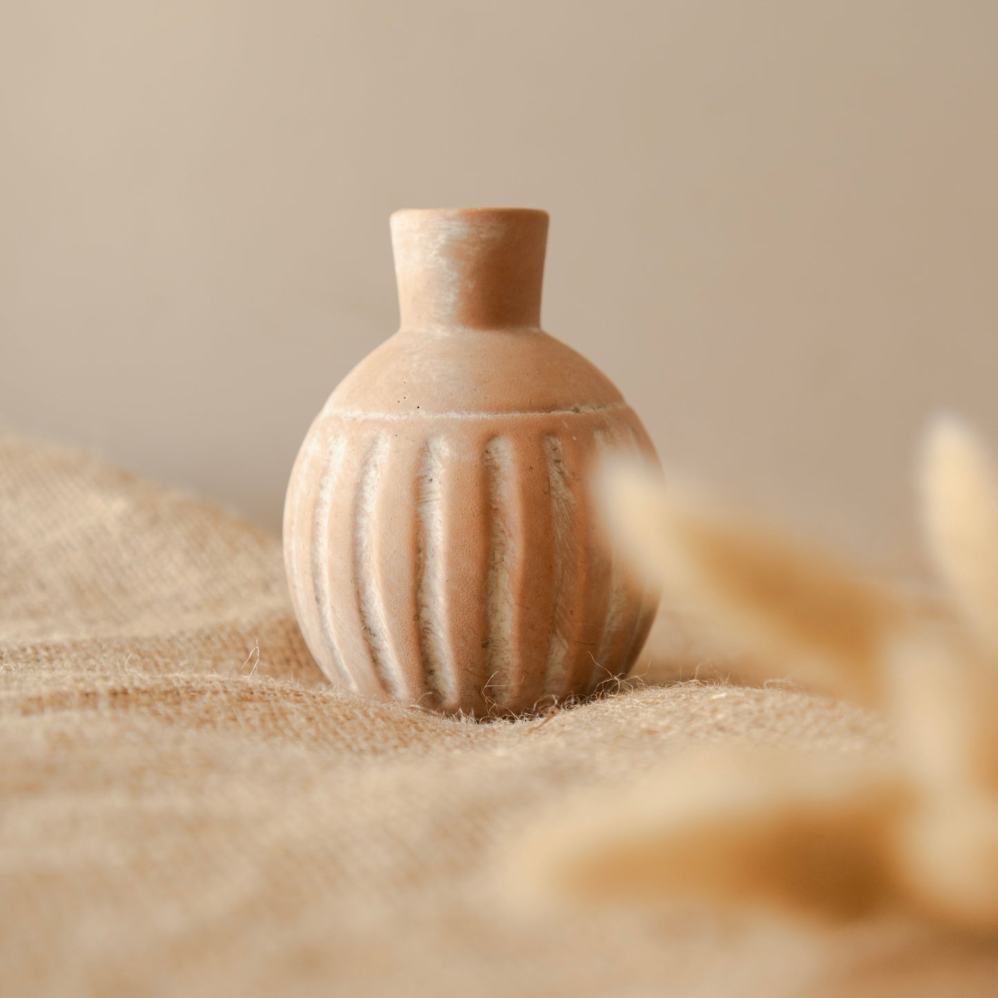 Rustic vase with bunny tails