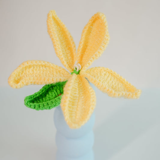 Stacked tiered pottery vase with crochet yellow Lily