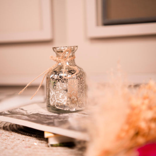 Silver blossom charm with bunch