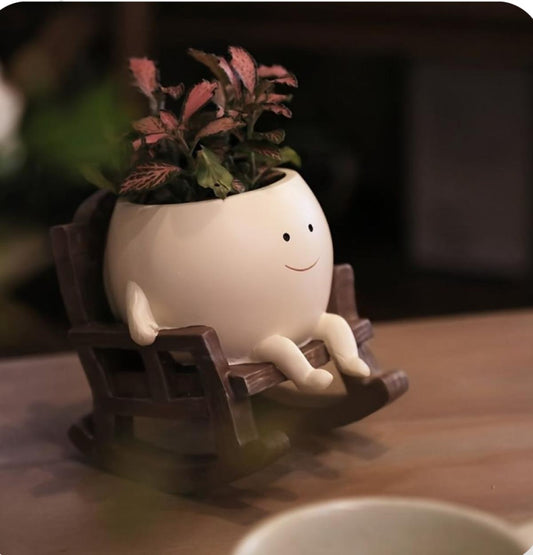 Swing planter on chair