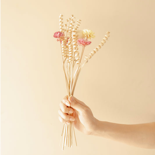 The Earthly vase with dried flower bunch