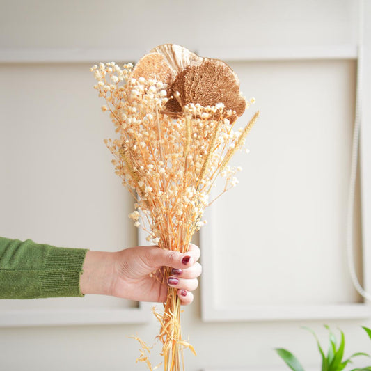 Golden harvest bunch with snow white vase