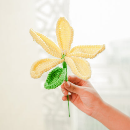 Stacked tiered pottery vase with crochet yellow Lily